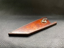 Load image into Gallery viewer, Hand dyed sunburst tan to brown Veg Tanned Leather outer with blue inserts and unique magnet securing mechanism. Fully handmade leather knife sheath which is completely hand stitched and hand finished to ensure the knife within is protected from the elements. We can design to our customer specifications to ensure you get a truly unique and bespoke item.www.leathercompositions.com