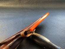 Load image into Gallery viewer, Wet molded leather which is hand dyed and hand finished to the highest standards. Handmade leather knife sheath which is fully hand stitched and hand finished to ensure the knife within is protected from the elements. We can design to our customer specifications to ensure you get a truly unique and bespoke item. www.leathercompositions.com