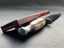 Load image into Gallery viewer, Full English bridle leather with unique welt made from multiple layers of leather to give a unique look. Handmade leather knife sheath which is fully hand stitched and hand finished to ensure the knife within is protected from the elements. We can design to our customer specifications to ensure you get a truly unique and bespoke item. www.leathercompositions.com