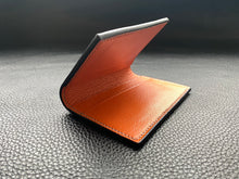 Load image into Gallery viewer, Handmade leather wallet is perfect for carrying your cards and looking stylish. Our handmade leather goods are completely UK made in our atelier using the finest leathers and traditional leather techniques, no machines are involved as our artisan hand stitches every items to ensure we produce luxury leather accessories to last a lifetime www.leathercompositions.com