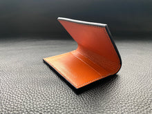 Load image into Gallery viewer, Handmade leather wallet is perfect for carrying your cards and looking stylish. Our handmade leather goods are completely UK made in our atelier using the finest leathers and traditional leather techniques, no machines are involved as our artisan hand stitches every items to ensure we produce luxury leather accessories to last a lifetime www.leathercompositions.com