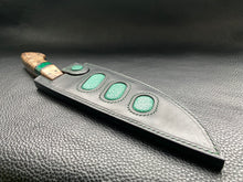 Load image into Gallery viewer, Black Lamport Leather outer and green stingray leather inserts, handmade leather knife sheath which is fully hand stitched and hand finished to ensure the knife within is protected from the elements. We can design to our customer specifications to ensure you get a truly unique and bespoke item.www.leathercompositions.com