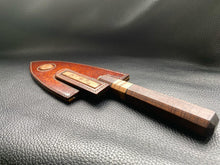 Load image into Gallery viewer, Hand dyed sunburst tan to brown Leather outer with Ostrich skin inlays and blue layers with a unique magnet securing mechanism. Fully handmade leather knife sheath which is completely hand stitched and hand finished to ensure the knife within is protected from the elements. We can design to our customer specifications to ensure you get a truly unique and bespoke item.www.leathercompositions.com