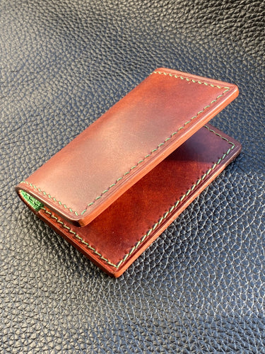 Our men's wallets are meticulously hand stitched using the finest leathers from around the world, whether you are looking for Italian vegetable tanned leather, shell Cordovan or exotic leathers then www.leathercompositions.com are able to produce something unique to you. Choose from our wallets in store or design your own unique colour and leather scheme