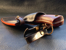 Load image into Gallery viewer, Wet molded leather which is hand dyed and hand finished to the highest standards. Handmade leather knife sheath which is fully hand stitched and hand finished to ensure the knife within is protected from the elements. We can design to our customer specifications to ensure you get a truly unique and bespoke item. www.leathercompositions.com
