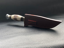 Load image into Gallery viewer, Full English bridle leather with unique welt made from multiple layers of leather to give a unique look. Handmade leather knife sheath which is fully hand stitched and hand finished to ensure the knife within is protected from the elements. We can design to our customer specifications to ensure you get a truly unique and bespoke item. www.leathercompositions.com
