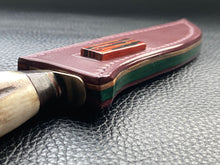 Load image into Gallery viewer, Full English bridle leather with unique welt made from multiple layers of leather to give a unique look. Handmade leather knife sheath which is fully hand stitched and hand finished to ensure the knife within is protected from the elements. We can design to our customer specifications to ensure you get a truly unique and bespoke item. www.leathercompositions.com
