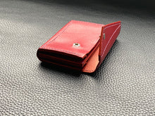 Load image into Gallery viewer, Ladies compact Italian leather purse, small enough to fit in your pocket and big enough to carry your cards and cash every day. Handmade without the use of any machines, meticulously hand stitched using a traditional saddle stitch. This purse is fully customisable in terms of leather, colour, thread and edge finish.www.leathercompositions.com
