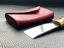 Load image into Gallery viewer, Ladies compact Italian leather purse, small enough to fit in your pocket and big enough to carry your cards and cash every day. Handmade without the use of any machines, meticulously hand stitched using a traditional saddle stitch. This purse is fully customisable in terms of leather, colour, thread and edge finish.www.leathercompositions.com
