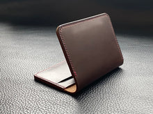 Load image into Gallery viewer, Handmade leather wallet is perfect for carrying your cards and looking stylish. Our handmade leather goods are completely UK made in our atelier using the finest leathers and traditional leather techniques, no machines are involved as our artisan hand stitches every items to ensure we produce luxury leather accessories to last a lifetime www.leathercompositions.com
