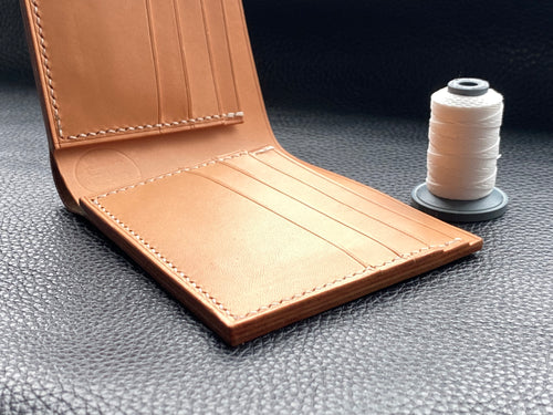 Our men's wallets are meticulously hand stitched using the finest leathers from around the world, whether you are looking for Italian vegetable tanned leather, shell Cordovan or exotic leathers then www.leathercompositions.com are able to produce something unique to you. Choose from our wallets in store or design your own unique colour and leather scheme