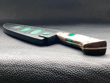Load image into Gallery viewer, Black Lamport Leather outer and green stingray leather inserts, handmade leather knife sheath which is fully hand stitched and hand finished to ensure the knife within is protected from the elements. We can design to our customer specifications to ensure you get a truly unique and bespoke item.www.leathercompositions.com
