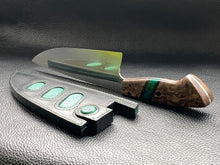 Load image into Gallery viewer, Black Lamport Leather outer and green stingray leather inserts, handmade leather knife sheath which is fully hand stitched and hand finished to ensure the knife within is protected from the elements. We can design to our customer specifications to ensure you get a truly unique and bespoke item.www.leathercompositions.com
