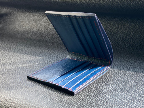 Our men's wallets are meticulously hand stitched using the finest leathers from around the world, whether you are looking for Italian vegetable tanned leather, shell Cordovan or exotic leathers then www.leathercompositions.com are able to produce something unique to you. Choose from our wallets in store or design your own unique colour and leather scheme
