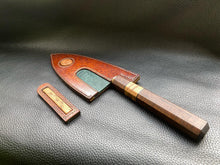 Load image into Gallery viewer, Hand dyed sunburst tan to brown Leather outer with Ostrich skin inlays and blue layers with a unique magnet securing mechanism. Fully handmade leather knife sheath which is completely hand stitched and hand finished to ensure the knife within is protected from the elements. We can design to our customer specifications to ensure you get a truly unique and bespoke item.www.leathercompositions.com
